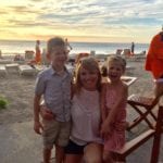 Tara Starkovich with kids on beach